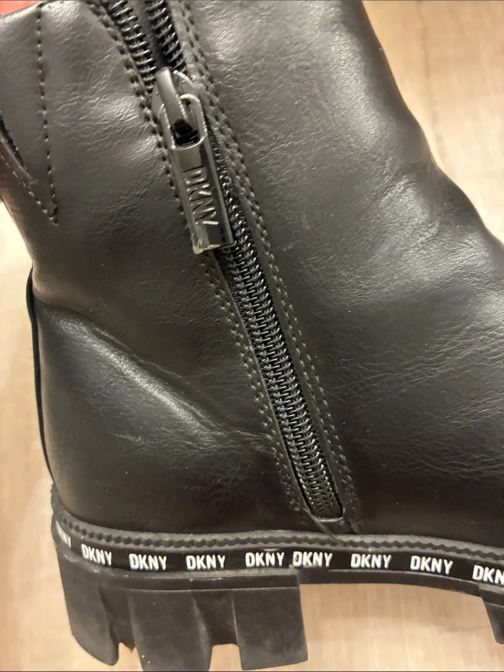 DKNY Black Leather Lug-Sole Ankle Boots with Logo Trim